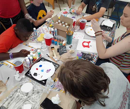 students working on arts and crafts