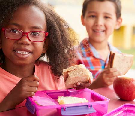 photo of children eating lunch