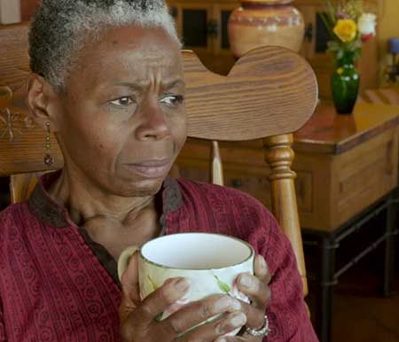 photo of a senior drinking cofee