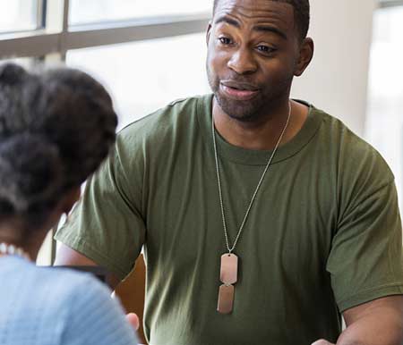 photo of a veteran sitting talking